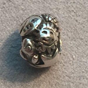 Trollbeads silver “Symbols” bead.